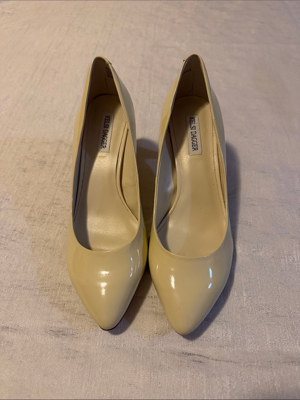 Kelsi Dagger Ivory Patent Pointed-Toe Pumps